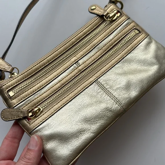 Gold metallic Coach legacy Zippy leather wristlet/baguette Clutch
